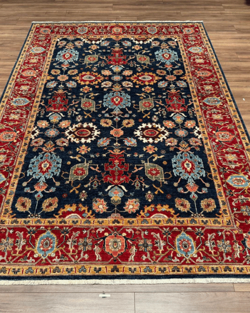 Ushak Hand-Knotted Wool Rug 7' x 9'