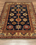 Shirvan Hand-Knotted Wool Rug 5' x 8'