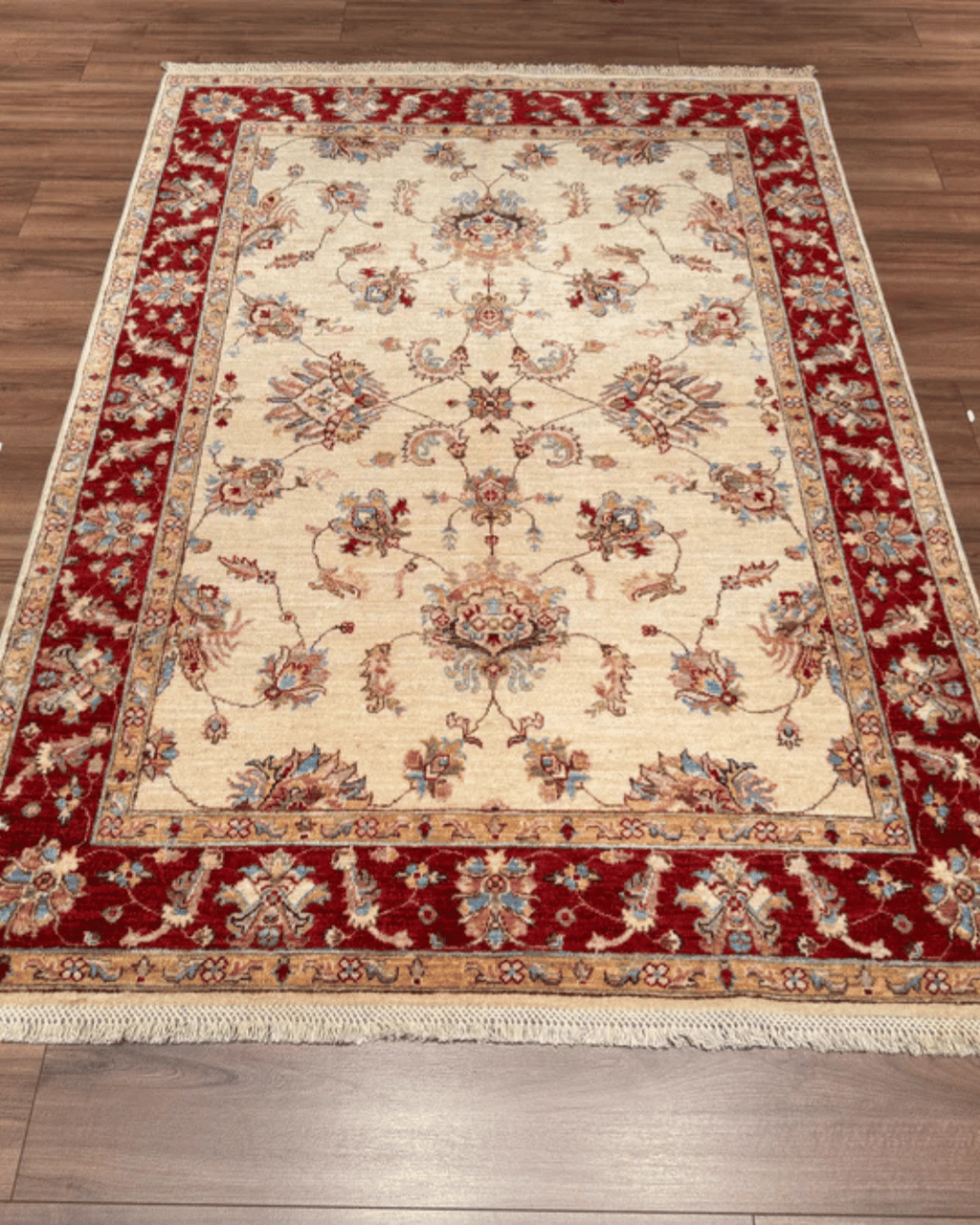 Ushak Hand-Knotted Wool Rug 5' x 7'