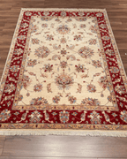 Ushak Hand-Knotted Wool Rug 5' x 7'