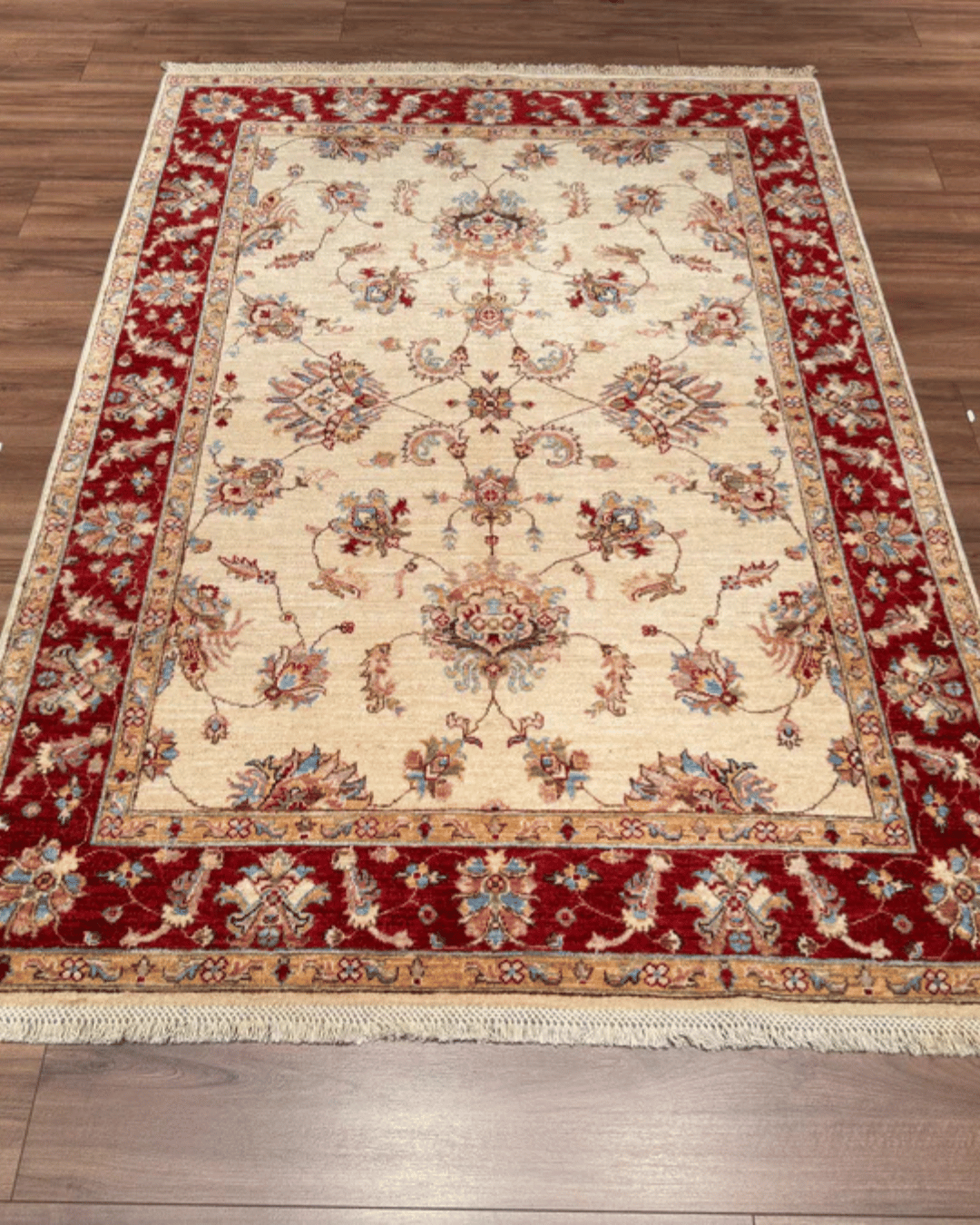 Ushak Hand-Knotted Wool Rug 5' x 7'