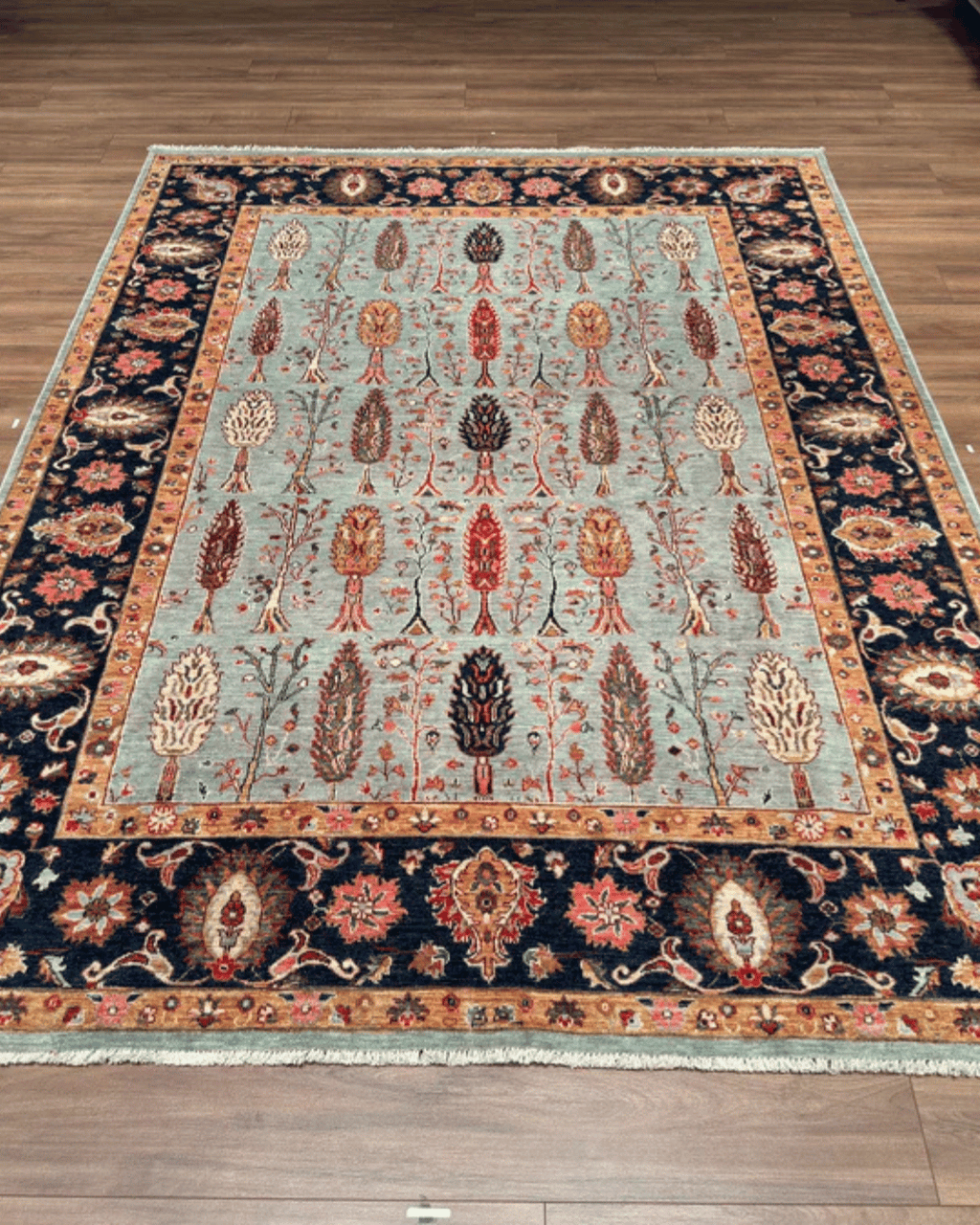 Ushak Hand-Knotted Wool Rug 7' x 9'
