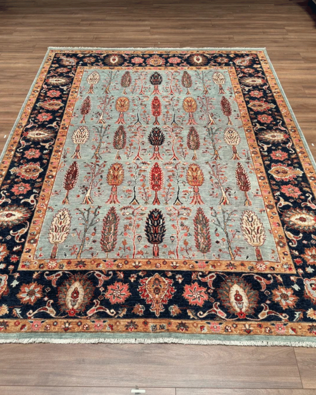 Ushak Hand-Knotted Wool Rug 7' x 9'