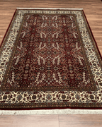 Hereke Hand-Knotted Wool Rug 6' 4" x 9' 7"