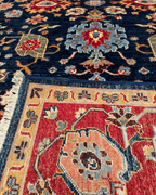 Ushak Hand-Knotted Wool Rug 7' x 9'