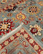 Ushak Hand-Knotted Wool Rug 7' x 10'