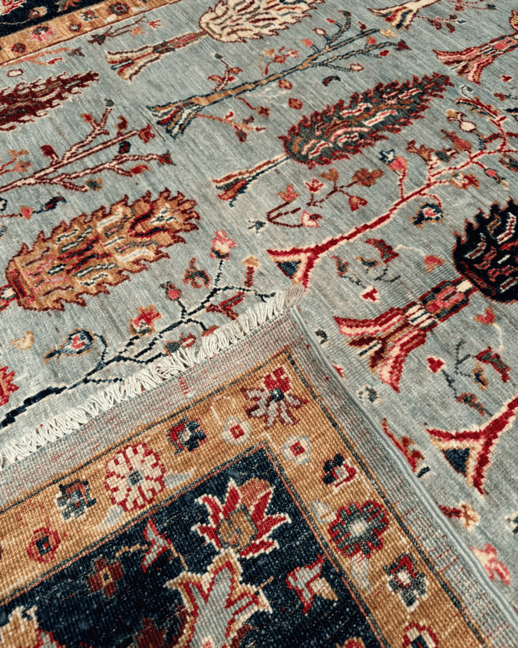 Ushak Hand-Knotted Wool Rug 7' x 9'