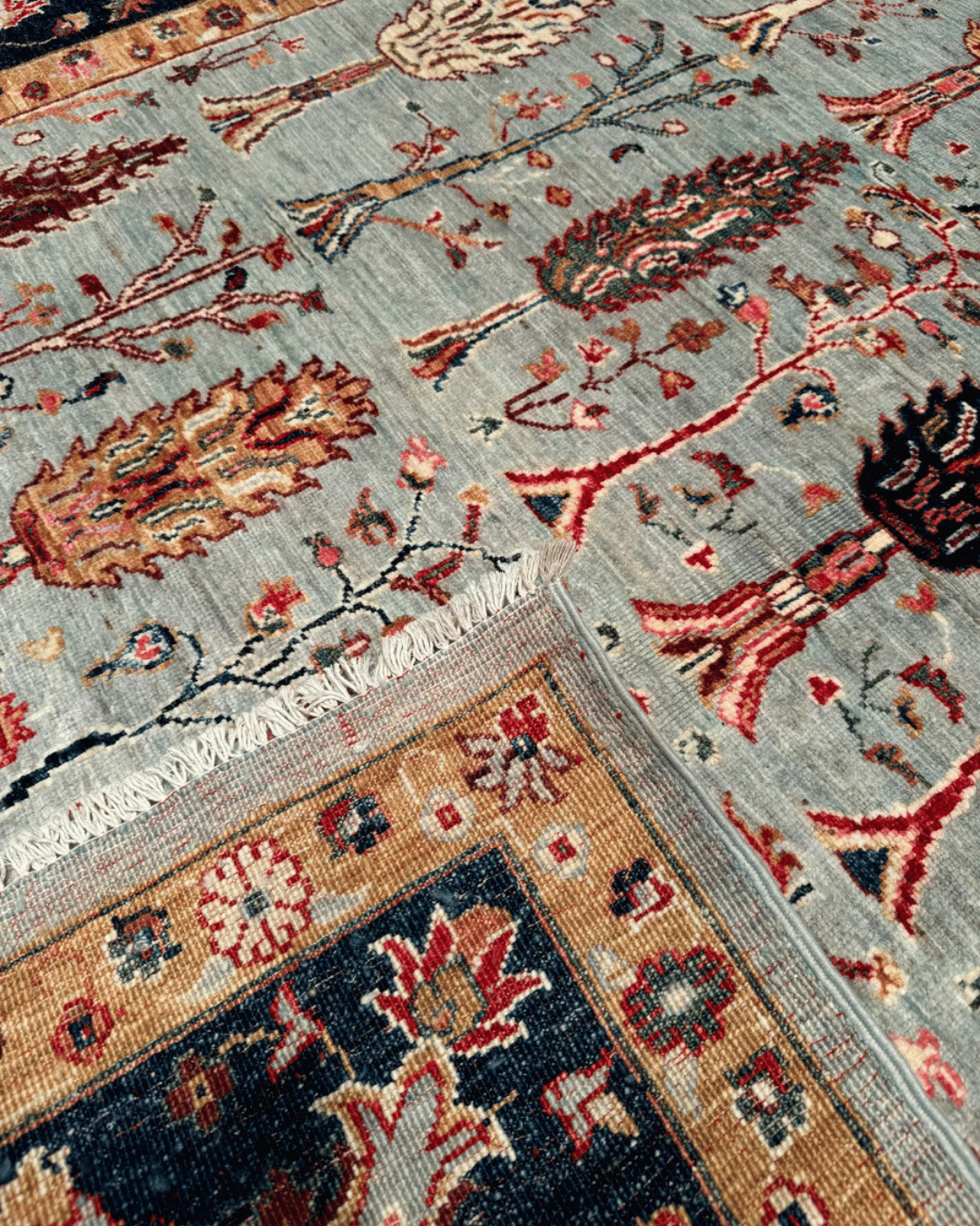 Ushak Hand-Knotted Wool Rug 7' x 9'